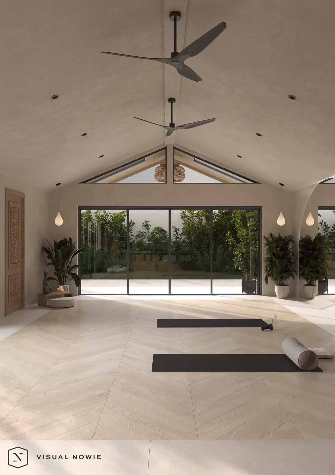 Yoga studio ADU with vaulted ceiling, sliding glass doors, rattan pendant, and indoor plants