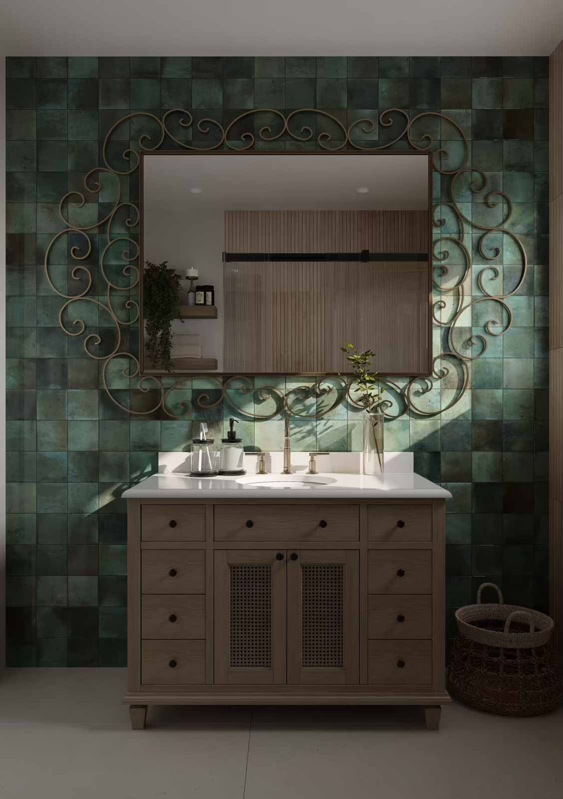 Artisan bathroom with emerald zellige tile, ornate scrollwork mirror, and cane detail vanity