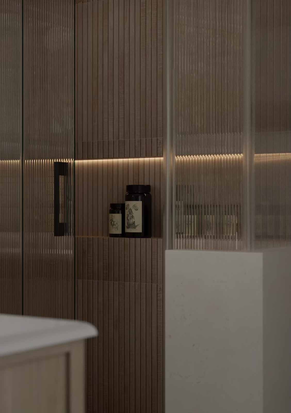 Shower niche detail with LED strip lighting and wood slat tile design