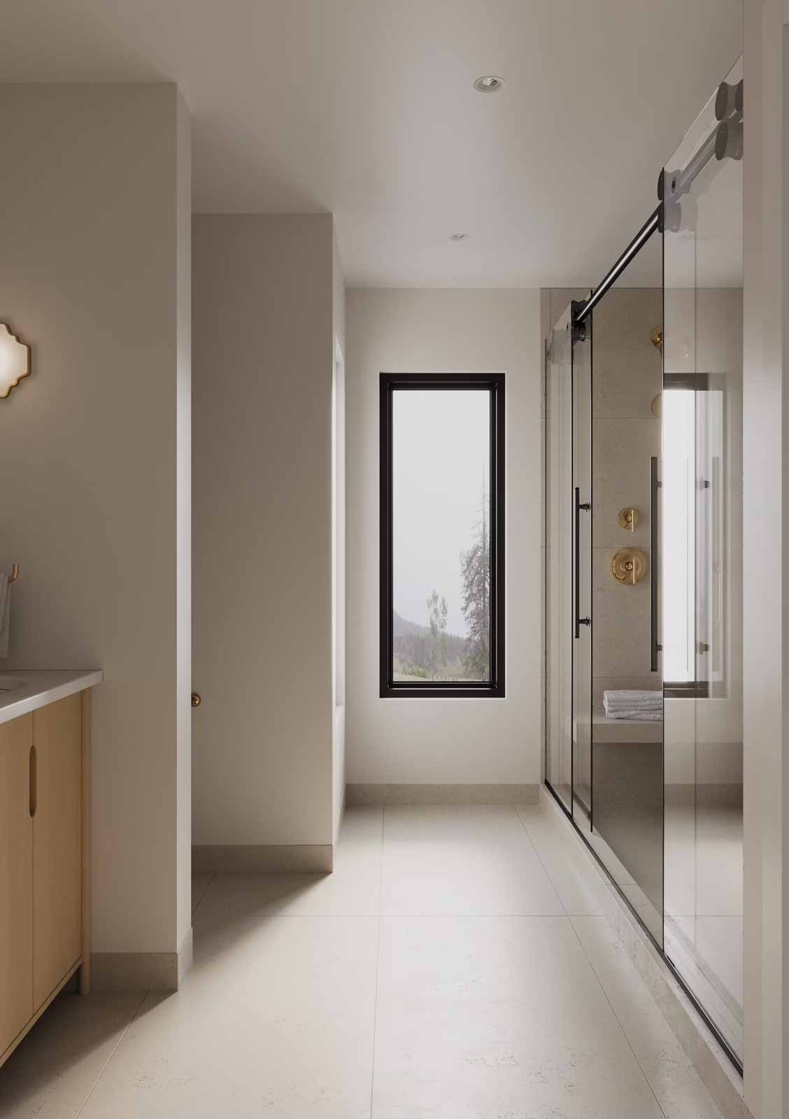 Modern master bath hallway with sliding glass shower, oak vanity, and black-framed window