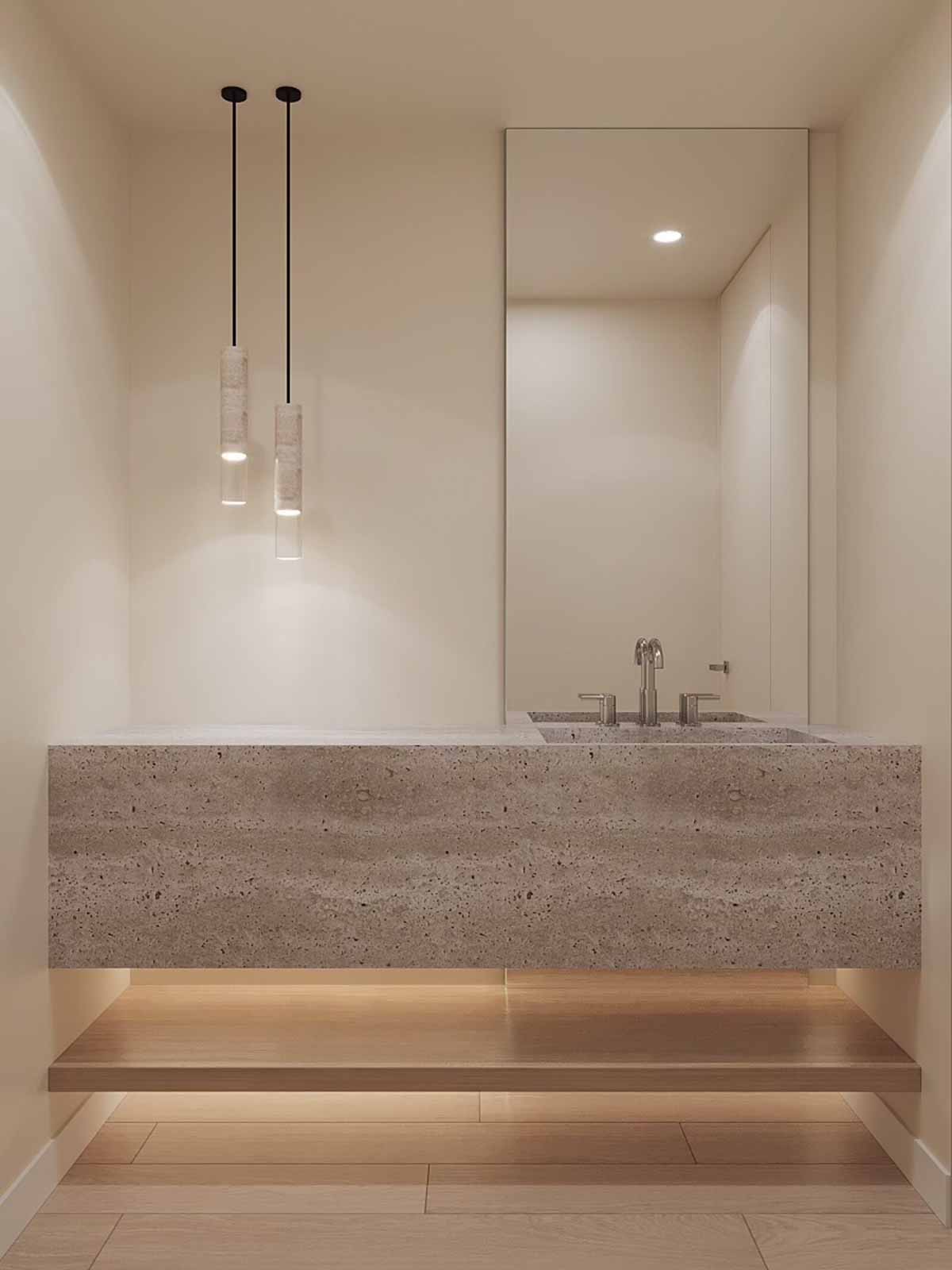 Floating travertine vanity with pendant lights, oak wood base, and minimalist design