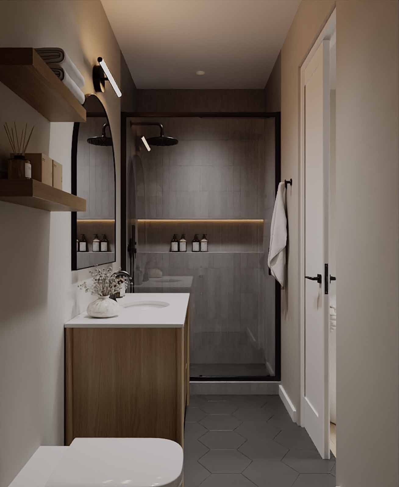 Contemporary bathroom with oak vanity, grey tile shower, floating shelves, and hexagon floor