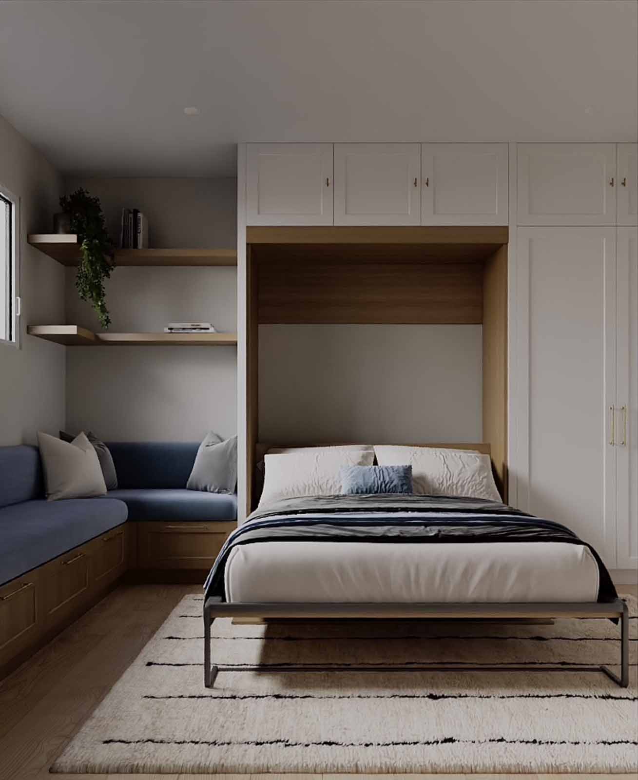 Compact Murphy bed room with built-in storage, blue banquette, and floating shelves