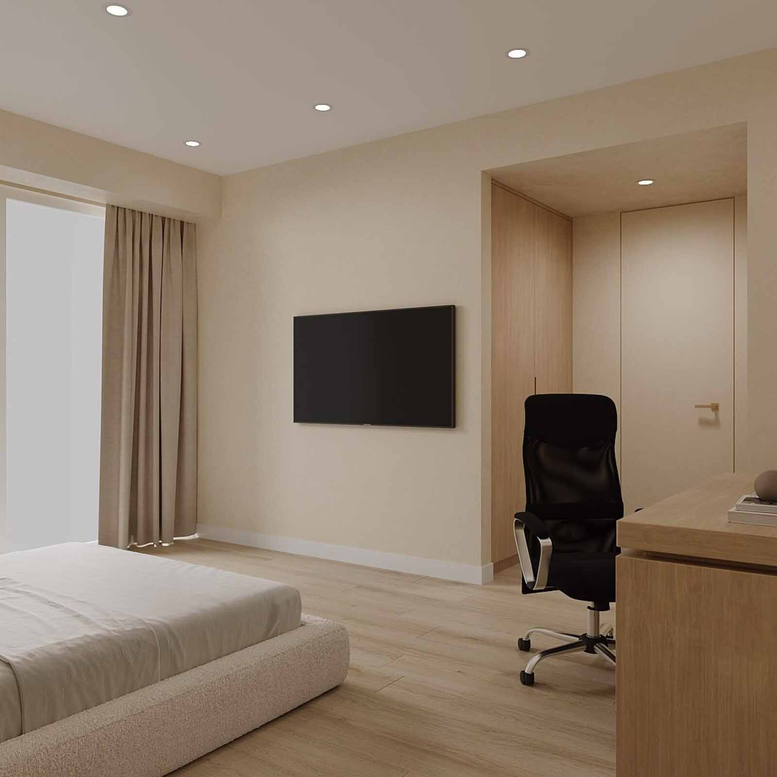 Modern bedroom-office with wall-mounted TV, ergonomic chair, oak desk, and recessed closet