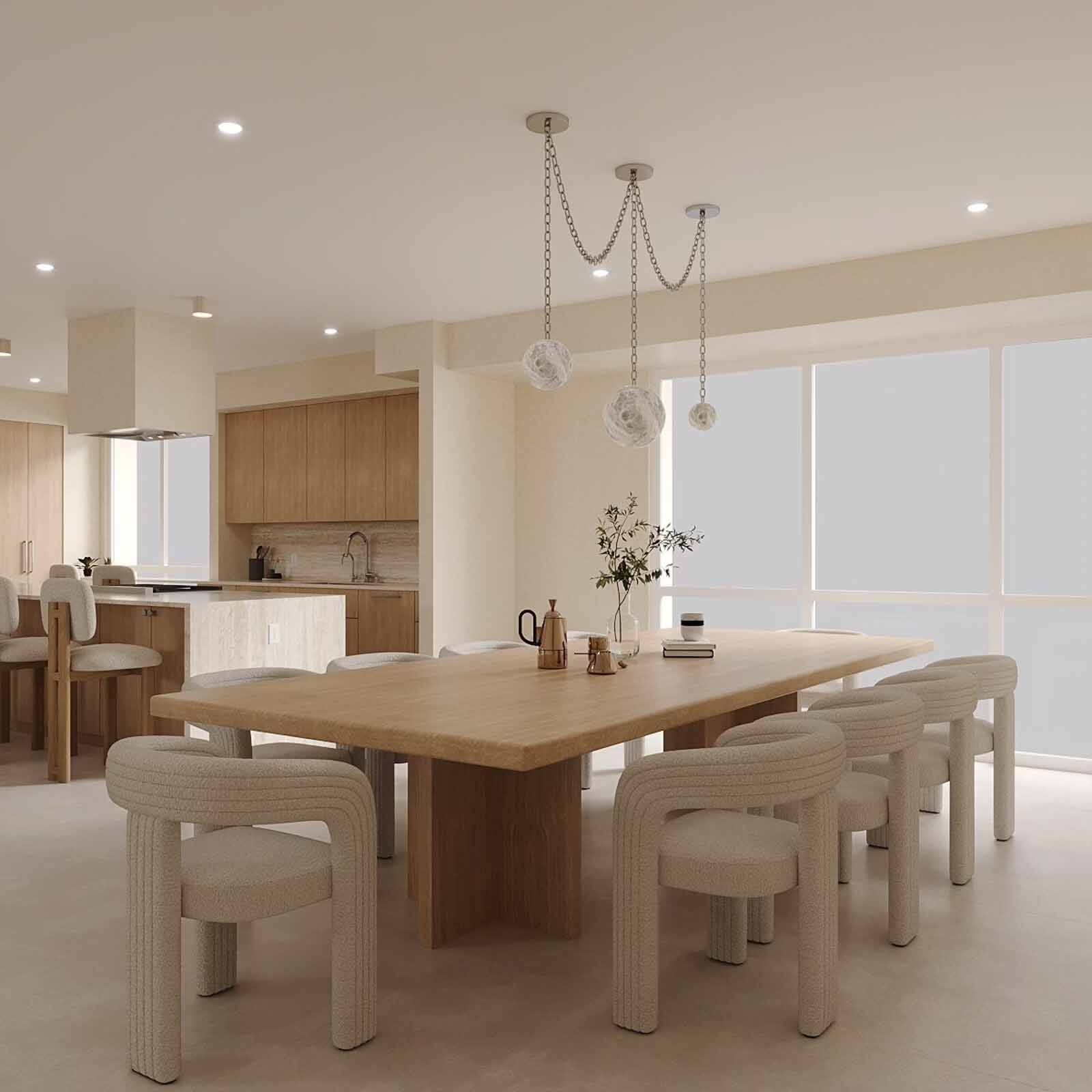 Contemporary dining room with oak slab table, boucle chairs, chain globe pendants, and open kitchen