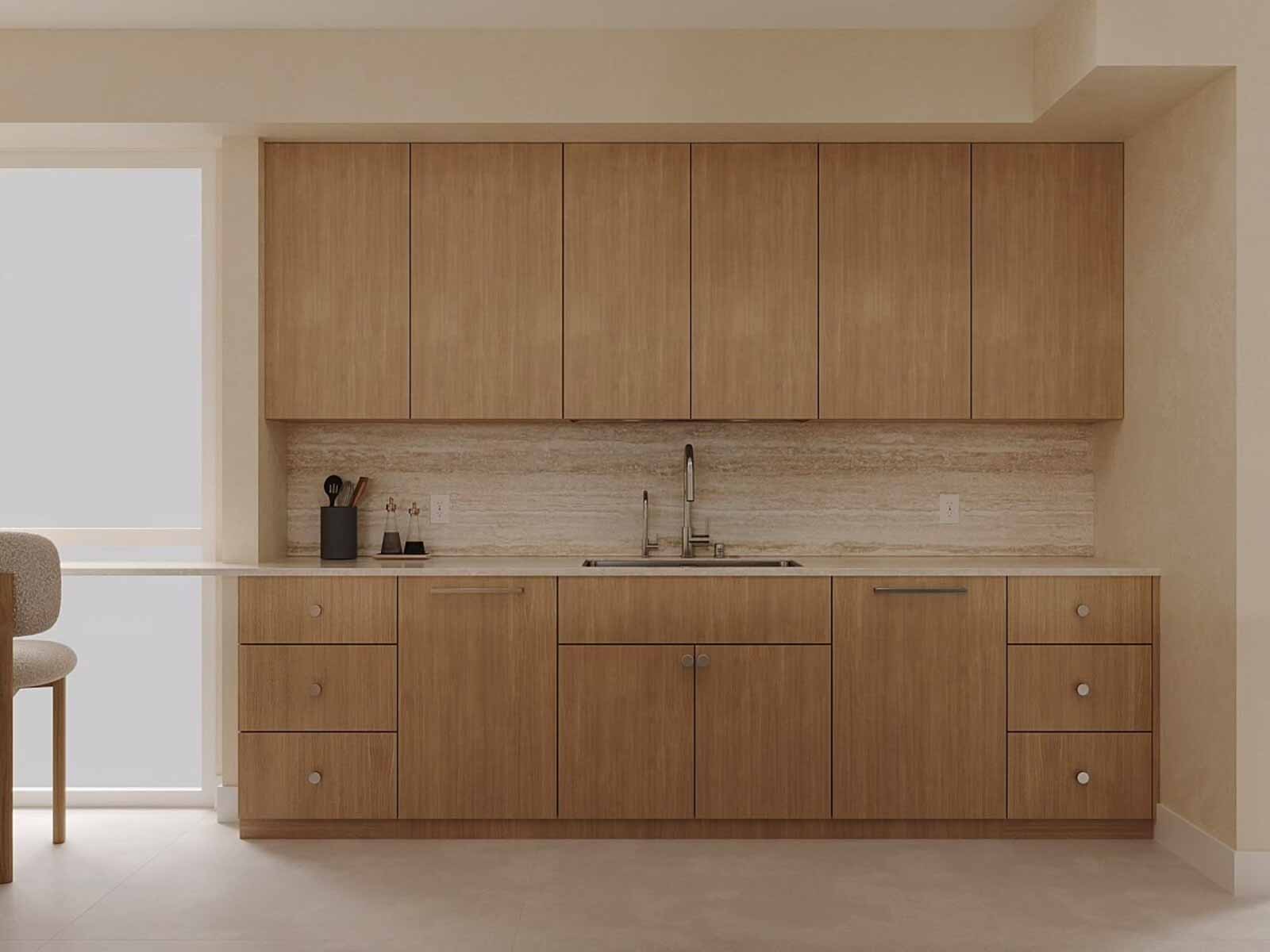 Warm oak kitchen with travertine backsplash, integrated appliances, and minimal hardware
