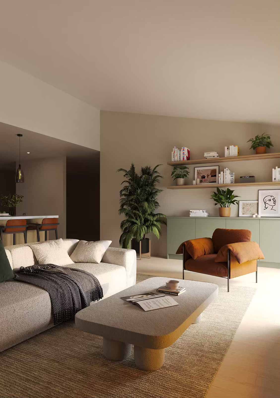 Sunlit living room with cream sofa, terracotta armchair, sage built-ins, and natural textures