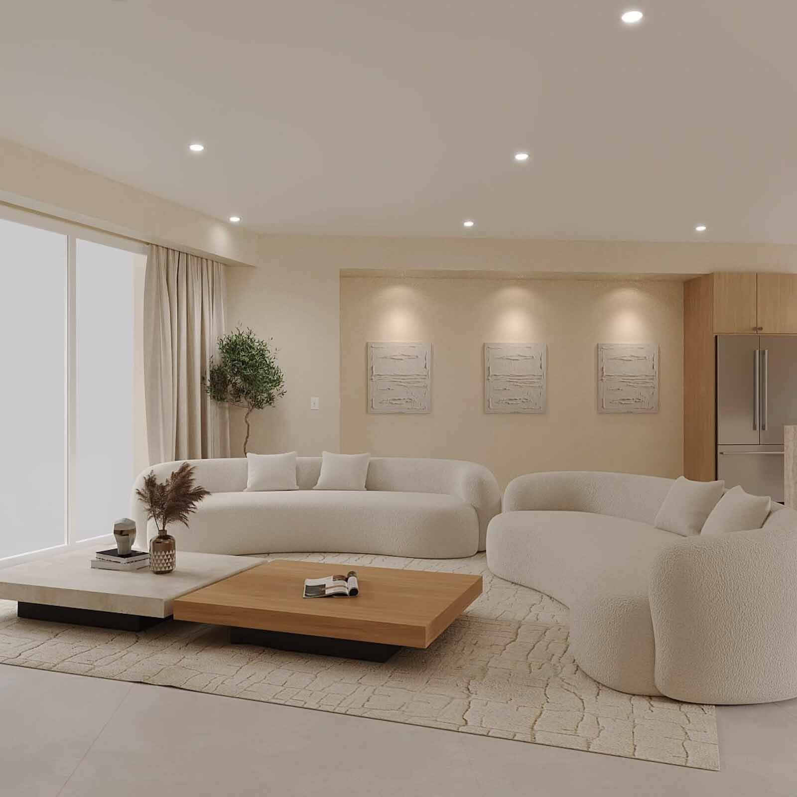 Open concept living room with curved boucle sofa, oak coffee table, and gallery wall