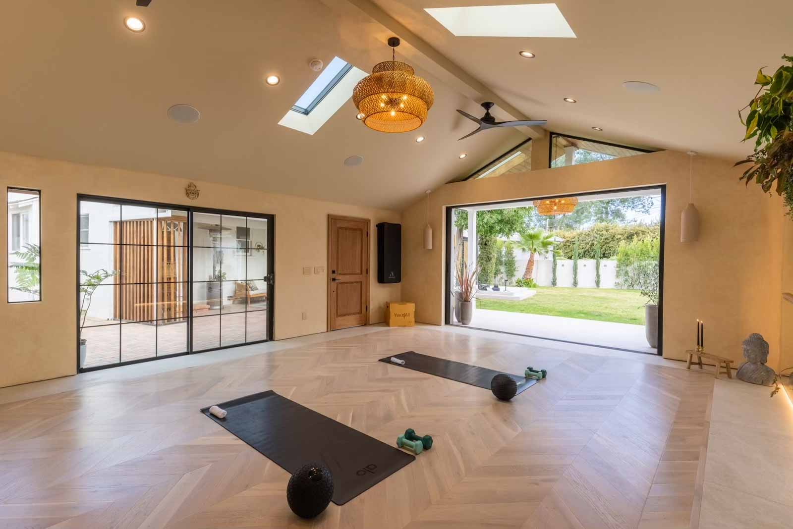 Studio showing seamless flow between indoor space and backyard garden