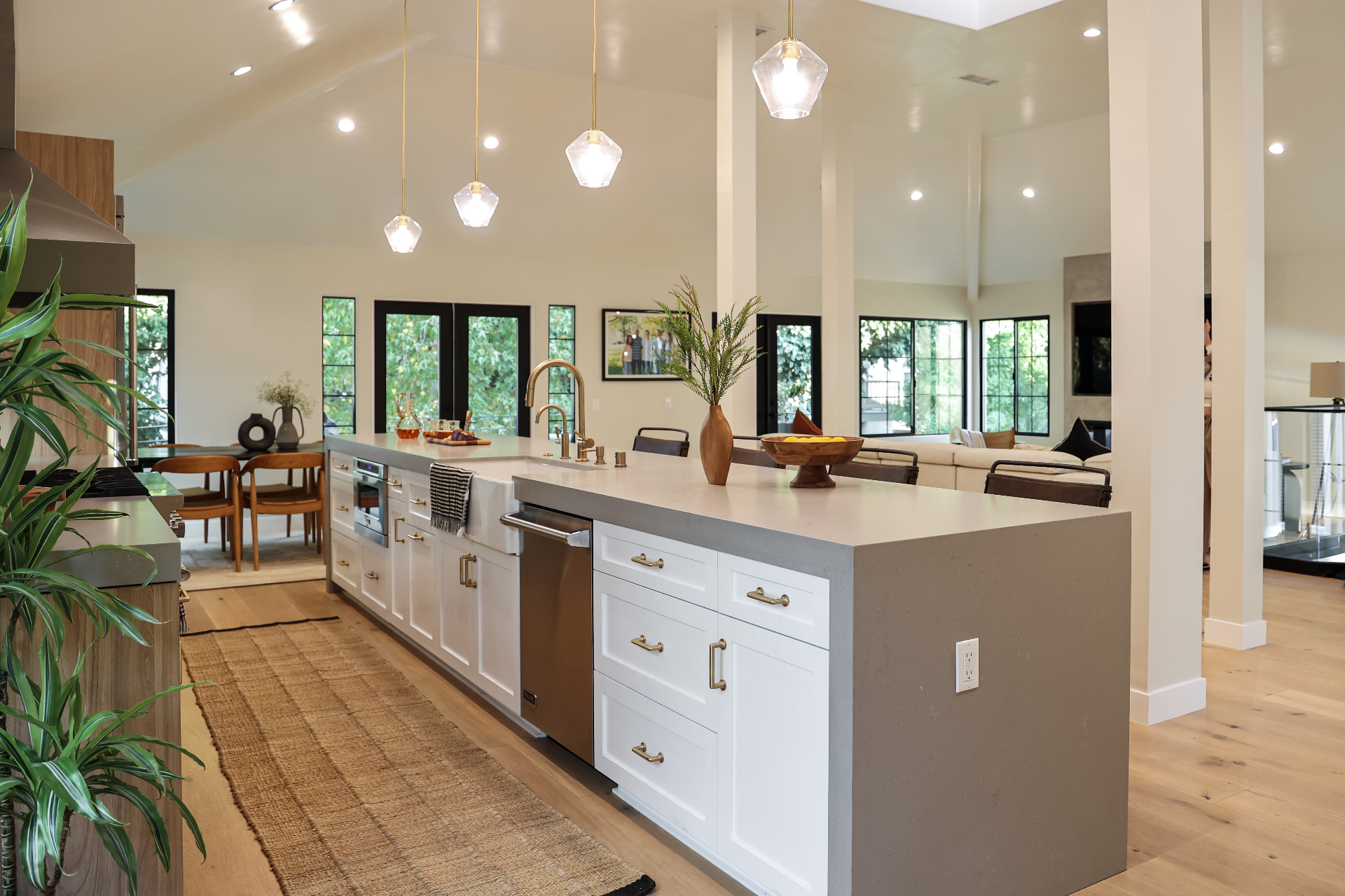 Contemporary Los Angeles kitchen with professional-grade stainless appliances, white shaker cabinets, and sophisticated design