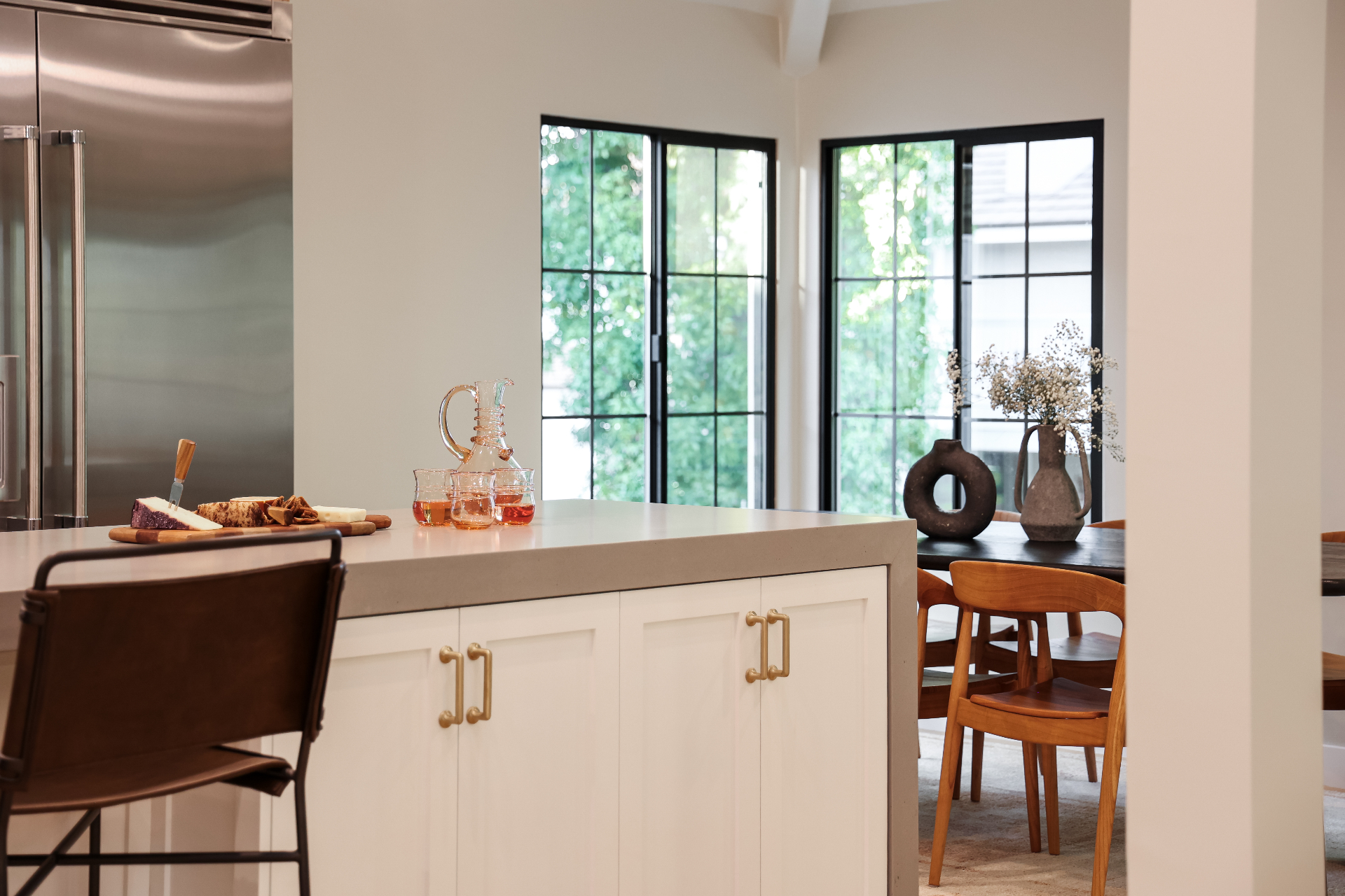 Glendale kitchen island with granite countertop bar seating area and modern pendant lighting fixtures