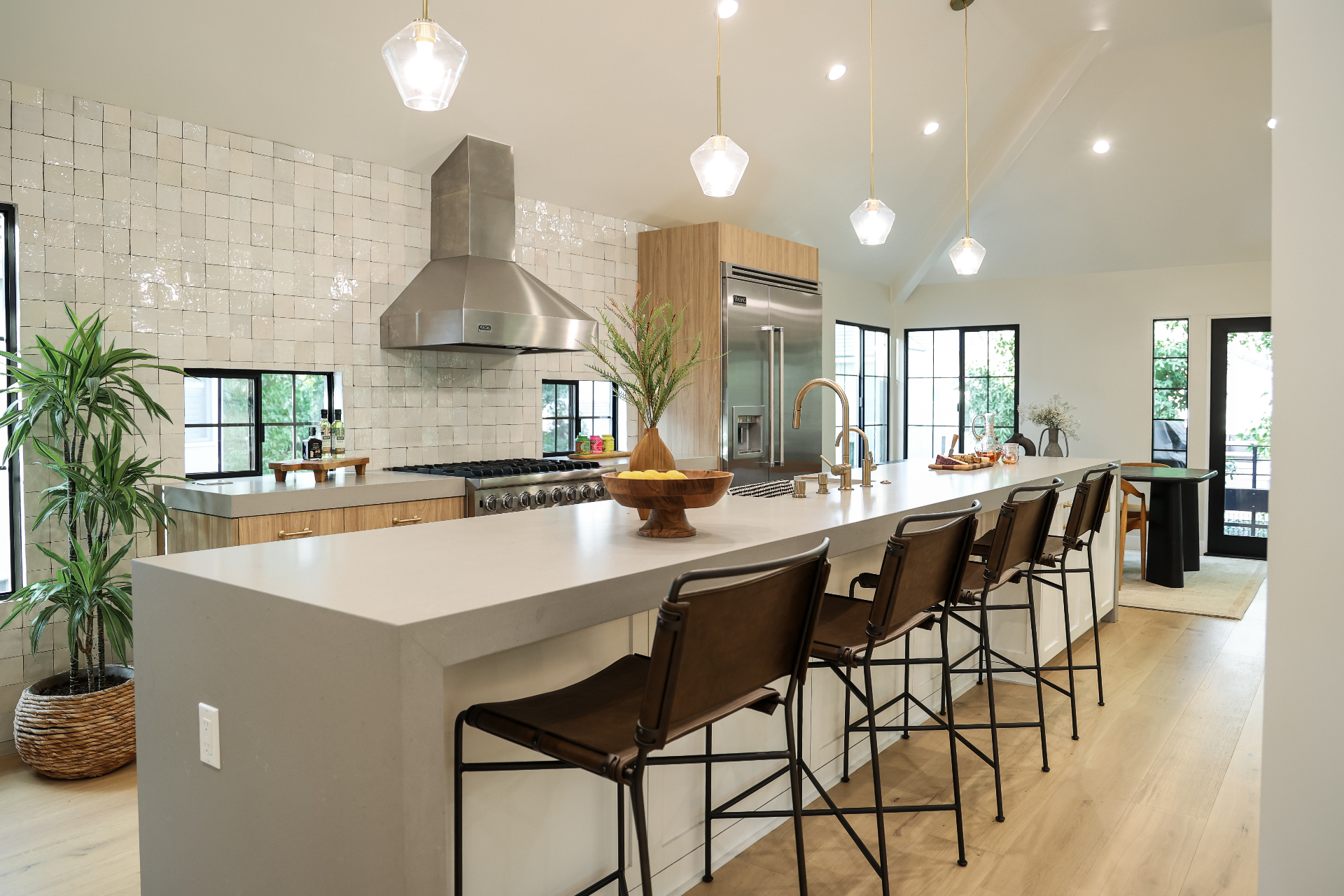Burbank kitchen with built-in breakfast nook seating area featuring cushioned bench and natural light