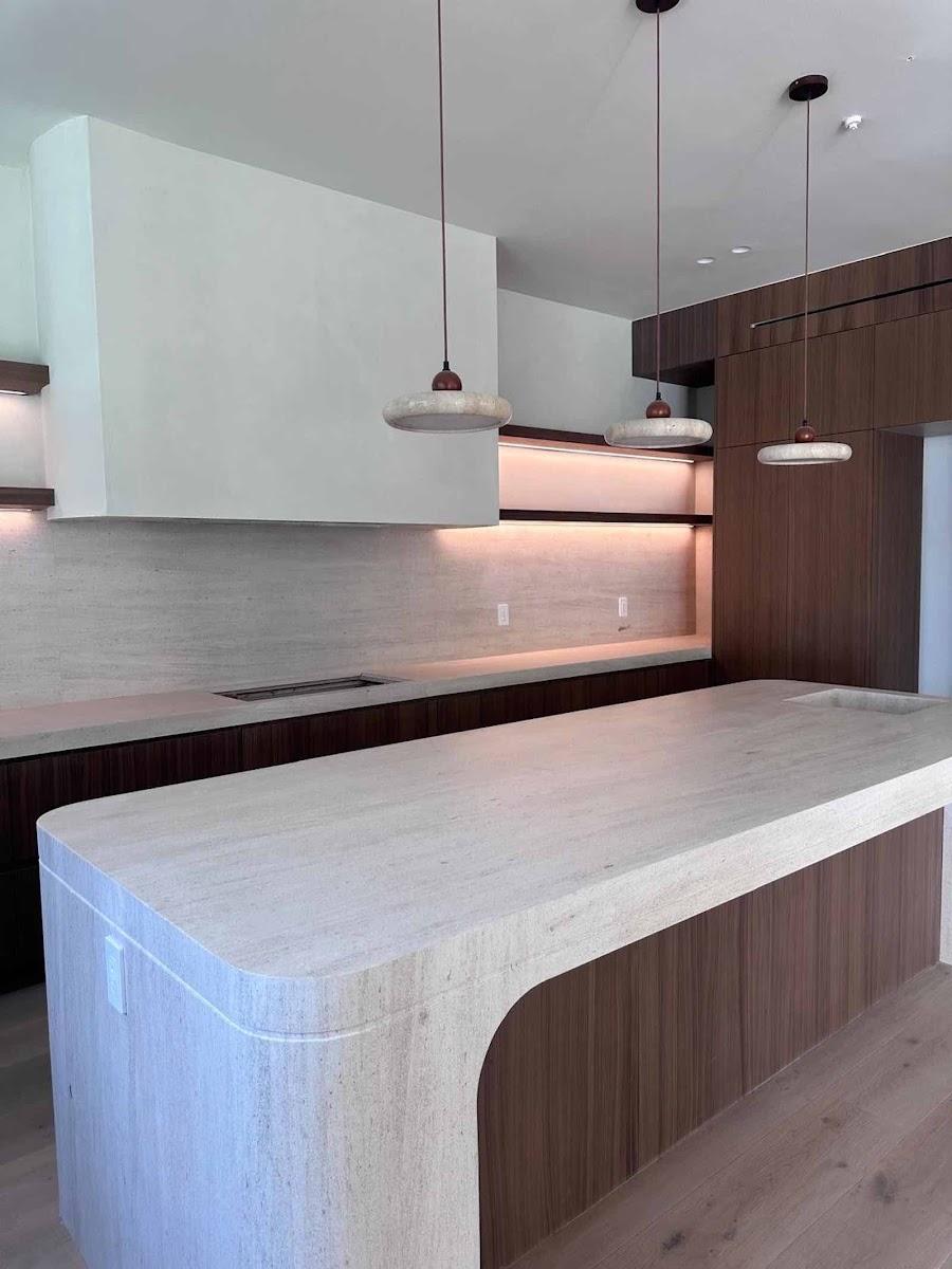 Encino Arch House kitchen with stone island and walnut paneling