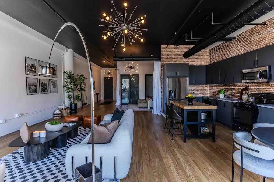 Hollywood Studio industrial living space with accent lighting