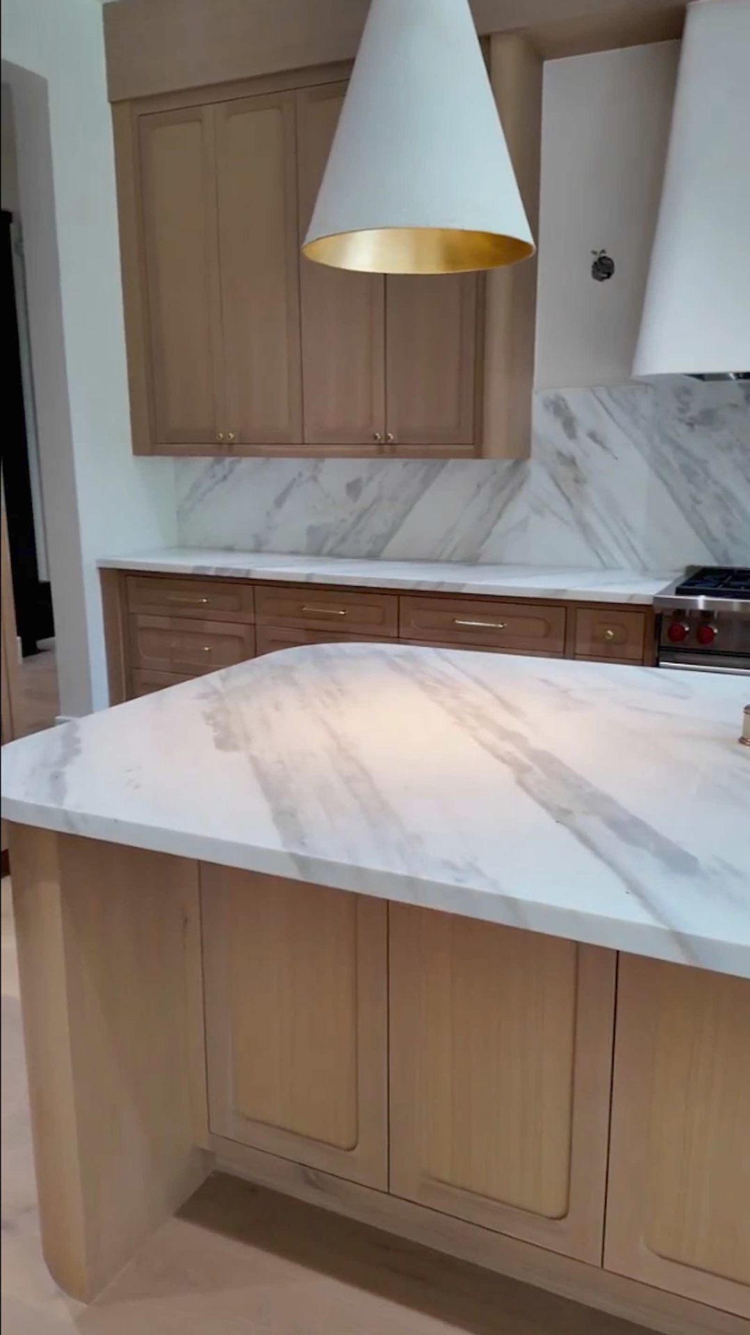Brentwood kitchen island marble countertop with gold-lined pendant