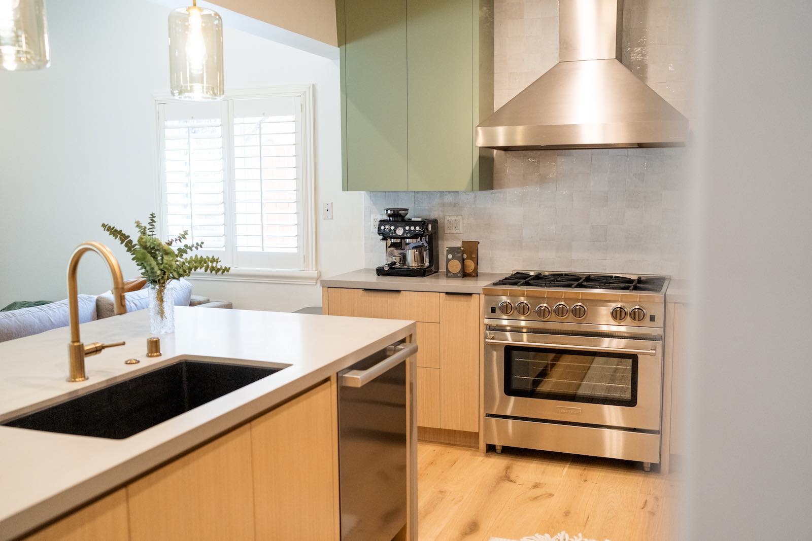 Claremont kitchen professional range with brass faucet and zellige tile backsplash