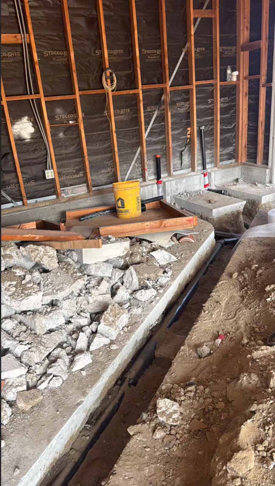 Room addition foundation and plumbing rough-in Los Angeles with framing and vapor barrier installed
