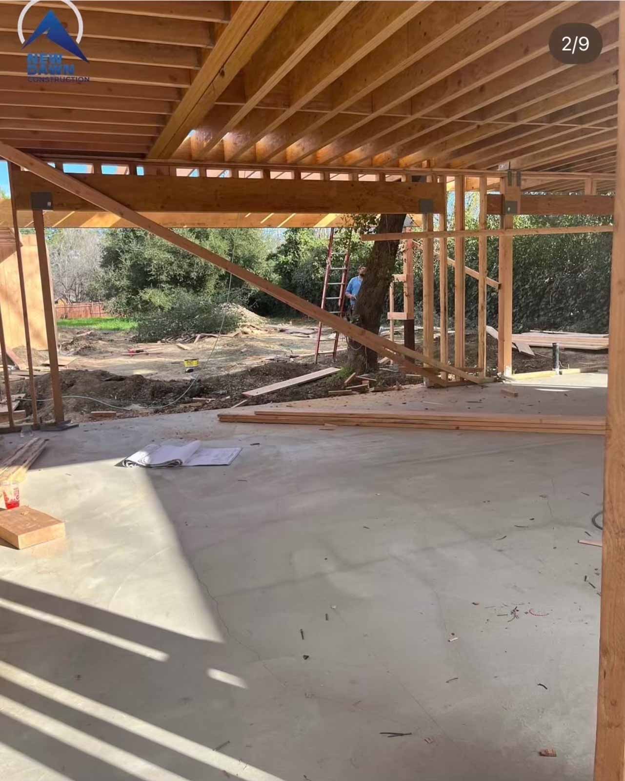 Large room addition floor framing Los Angeles with ceiling joists and diagonal bracing in progress