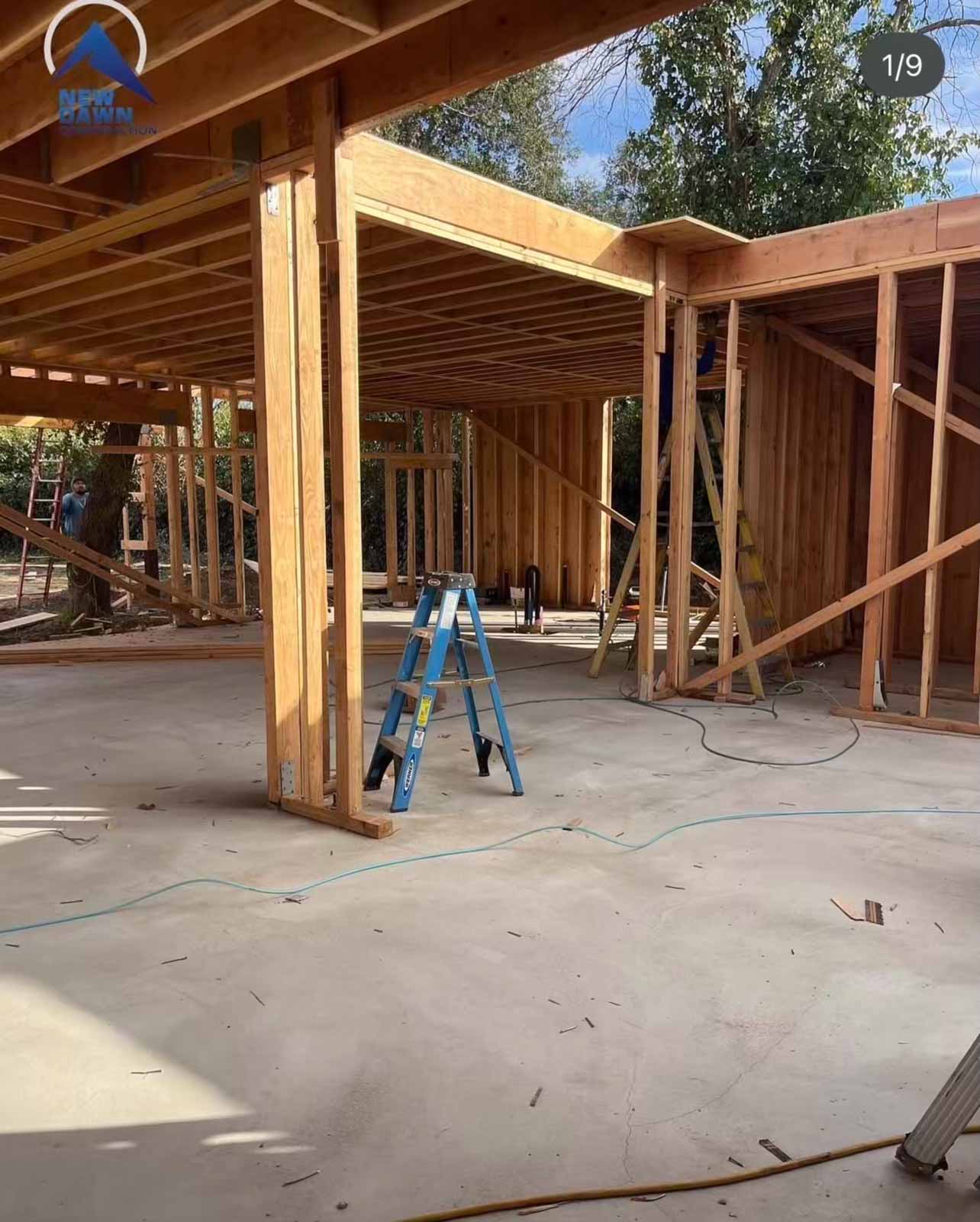 Room addition framing interior showing multiple room layout and header installation - LA County expansion