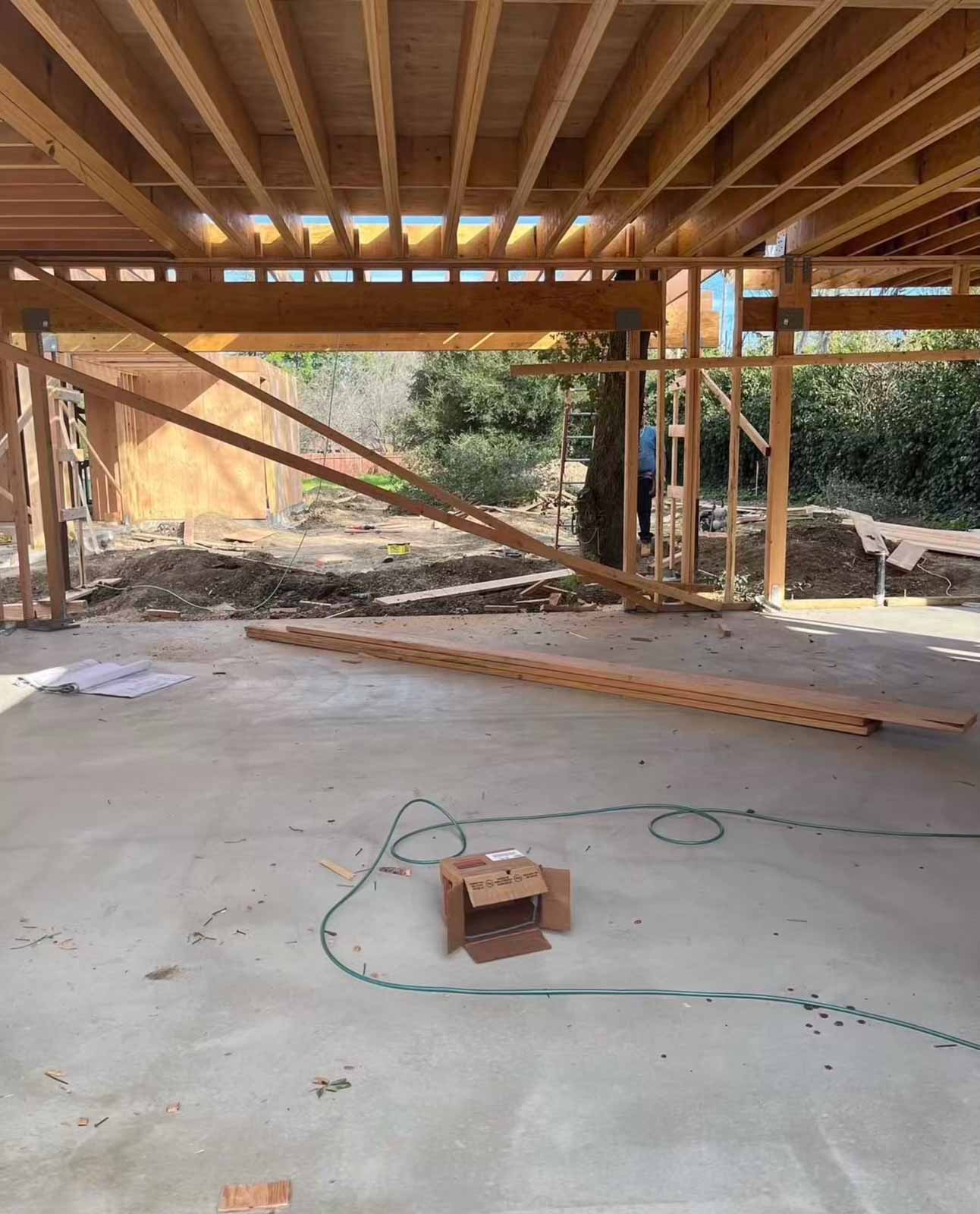 Room addition framing Sherman Oaks with floor joists and steel beam support - residential expansion